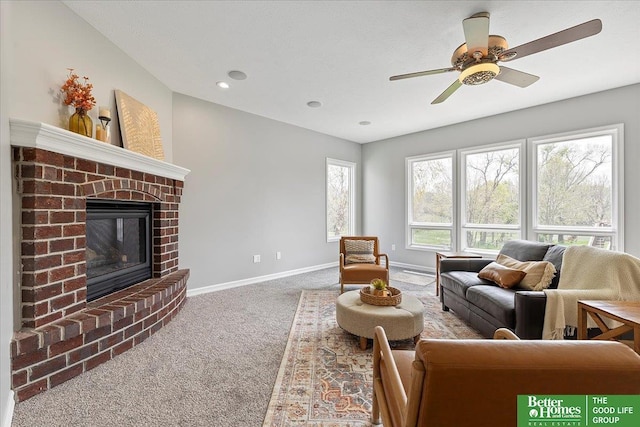 16831 Chandler St, Omaha, NE 68136 - carpeted living area with a fireplace, baseboards, and ceiling fan