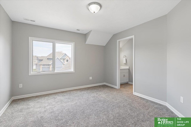 16831 Chandler St, Omaha, NE 68136 - unfurnished bedroom with carpet floors, baseboards, and connected bathroom