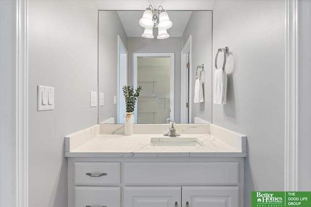 16831 Chandler St, Omaha, NE 68136 - bathroom featuring vanity and a chandelier