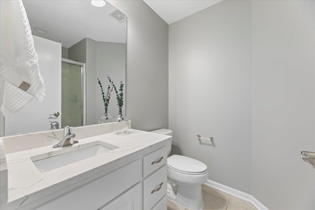 16831 Chandler St, Omaha, NE 68136 - bathroom featuring tile patterned flooring, vanity, a stall shower, toilet, and baseboards