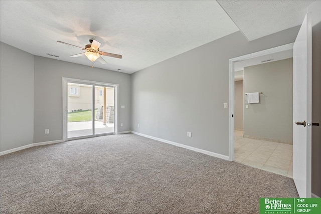 16831 Chandler St, Omaha, NE 68136 - unfurnished room with light carpet, a ceiling fan, a textured ceiling, and baseboards
