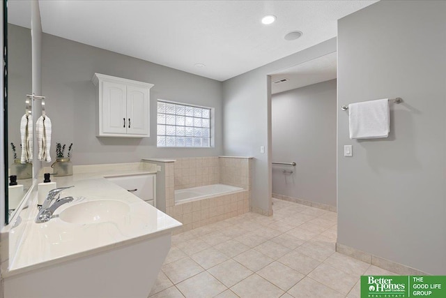 16831 Chandler St, Omaha, NE 68136 - full bathroom featuring a bath, tile patterned flooring, vanity, and baseboards