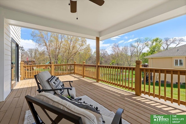 16831 Chandler St, Omaha, NE 68136 - deck with a ceiling fan and a lawn