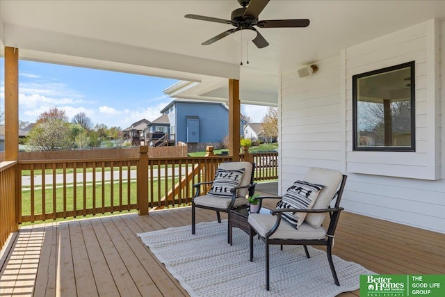 16831 Chandler St, Omaha, NE 68136 - wooden deck with ceiling fan, a lawn, and a residential view