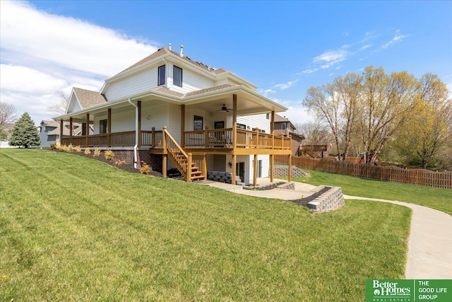 16831 Chandler St, Omaha, NE 68136 - back of house featuring ceiling fan and stairs