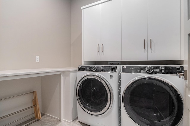 1520 S 218th St, Elkhorn, NE 68022 - laundry room with washing machine and clothes dryer and cabinet space