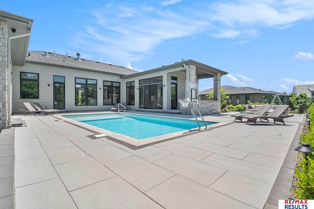 1520 S 218th St, Elkhorn, NE 68022 - swimming pool featuring a patio