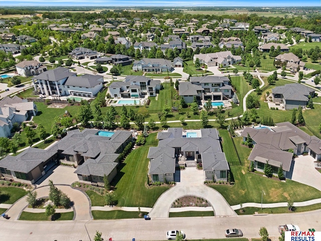 1520 S 218th St, Elkhorn, NE 68022 - aerial view of property and surrounding area with nearby suburban area and a pool