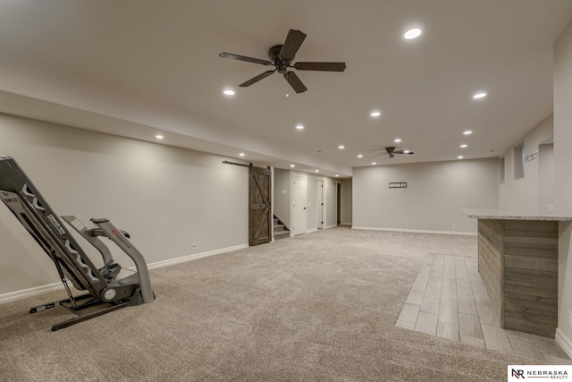 11051 Edgewater Dr, Papillion, NE 68046 - finished below grade area featuring recessed lighting, baseboards, a ceiling fan, light colored carpet, and stairs