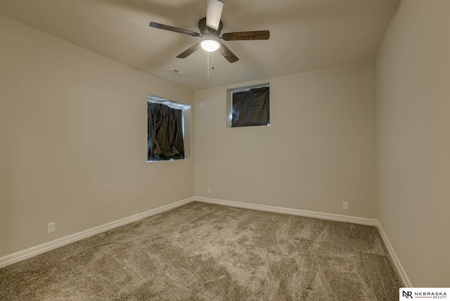 11051 Edgewater Dr, Papillion, NE 68046 - empty room with carpet flooring, a ceiling fan, and baseboards