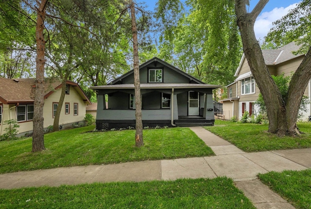 4709 Cuming St, Omaha, NE 68132 - bungalow-style house with a front yard and a porch