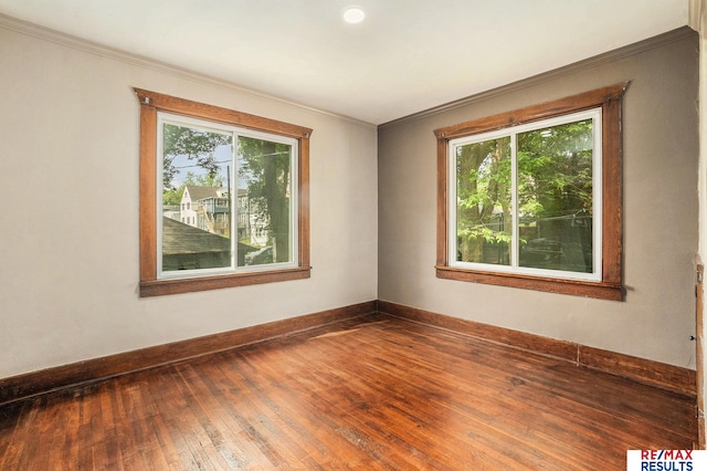 4709 Cuming St, Omaha, NE 68132 - empty room featuring hardwood / wood-style floors, baseboards, and ornamental molding