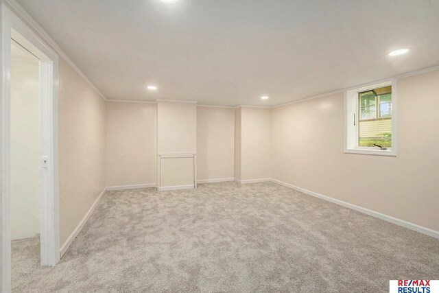 4709 Cuming St, Omaha, NE 68132 - basement featuring recessed lighting, carpet floors, baseboards, and crown molding