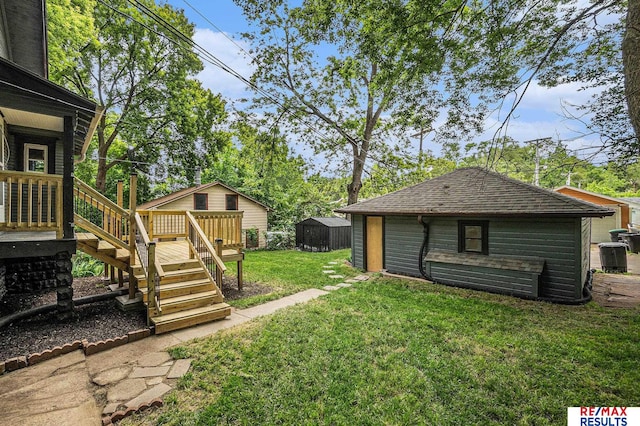 4709 Cuming St, Omaha, NE 68132 - view of grassy yard with stairway and a deck