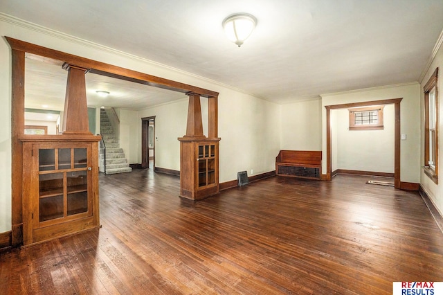 4709 Cuming St, Omaha, NE 68132 - unfurnished room featuring ornamental molding, hardwood / wood-style floors, stairway, baseboards, and decorative columns