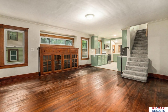4709 Cuming St, Omaha, NE 68132 - unfurnished living room with hardwood / wood-style floors, ornamental molding, stairs, and baseboards
