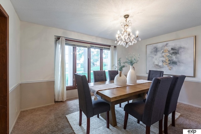 12212 Leavenworth Rd, Omaha, NE 68154 - dining area featuring a chandelier, carpet flooring, and baseboards