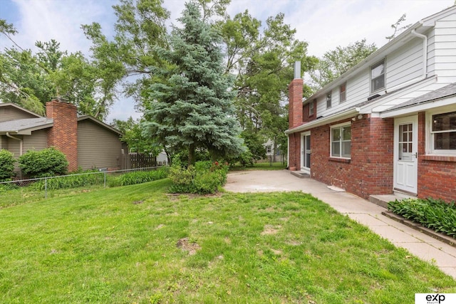 12212 Leavenworth Rd, Omaha, NE 68154 - view of yard featuring a patio area