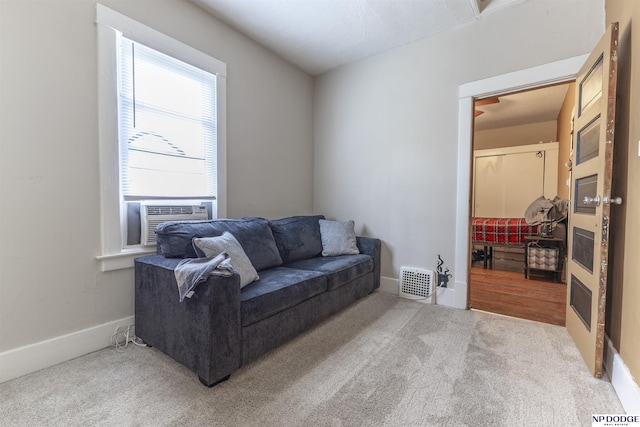 3359 N 41st St, Omaha, NE 68111 - living area with carpet flooring, baseboards, and cooling unit