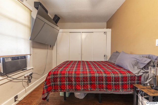 3359 N 41st St, Omaha, NE 68111 - bedroom featuring wood finished floors, a closet, and baseboards
