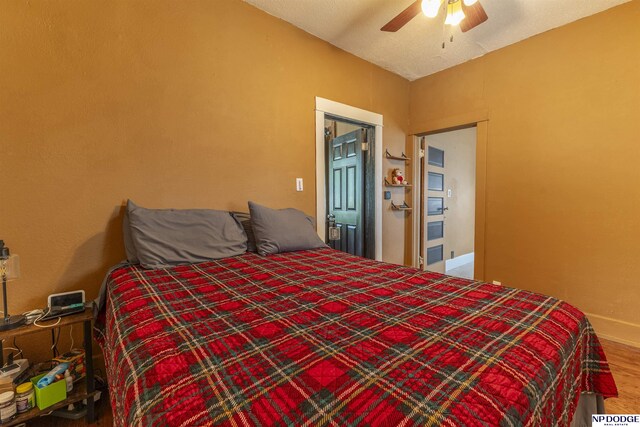 3359 N 41st St, Omaha, NE 68111 - bedroom featuring wood finished floors, baseboards, and ceiling fan