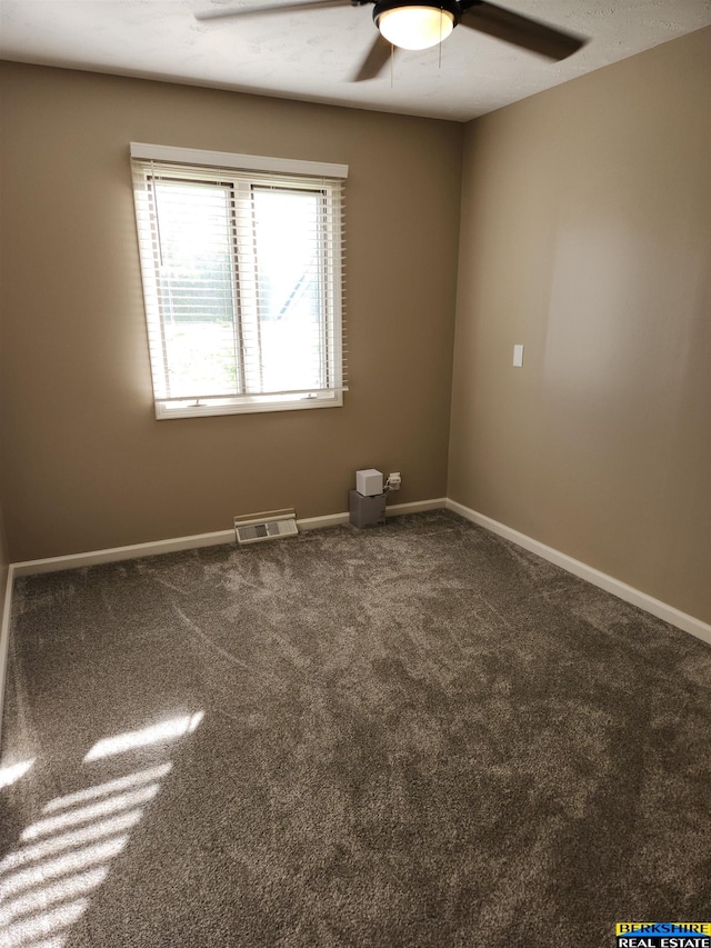 3608 S 87th Ave, Omaha, NE 68124 - carpeted empty room featuring a ceiling fan and baseboards