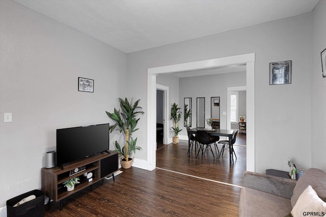 4411 Commercial Ave, Omaha, NE 68110 - living area with wood finished floors and baseboards