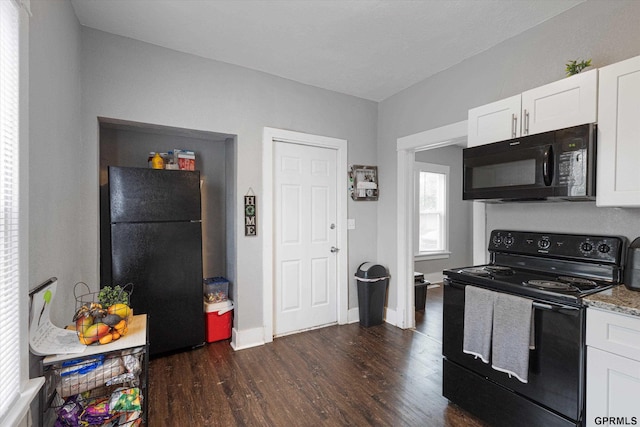 4411 Commercial Ave, Omaha, NE 68110 - kitchen with black appliances, dark wood-style floors, white cabinetry, baseboards, and light stone countertops