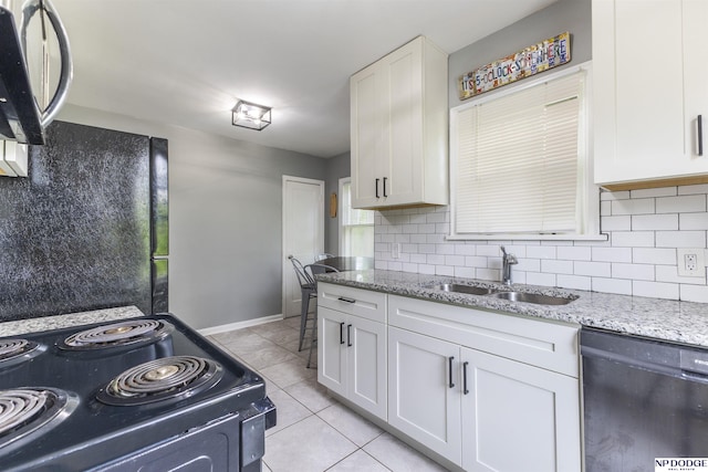 3185 Stone Ave, Omaha, NE 68111 - kitchen featuring dishwasher, range with electric stovetop, a sink, and tasteful backsplash