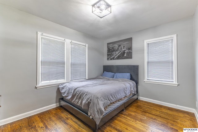 3185 Stone Ave, Omaha, NE 68111 - bedroom featuring baseboards and wood finished floors