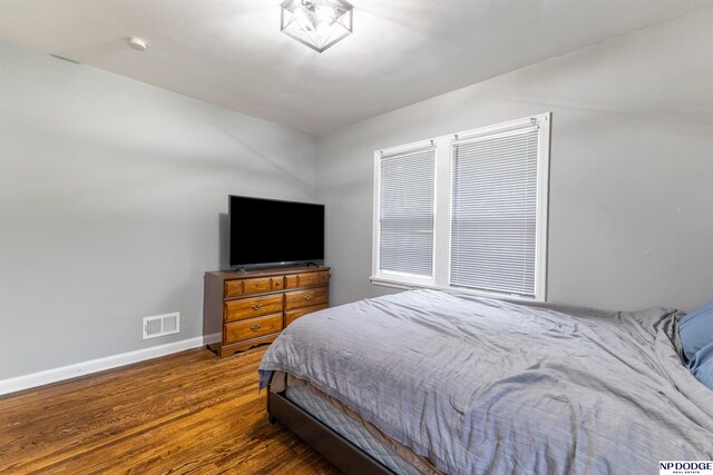 3185 Stone Ave, Omaha, NE 68111 - bedroom featuring baseboards and wood finished floors