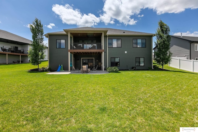 3310 N 92nd St, Lincoln, NE 68507 - rear view of house with a patio and a balcony