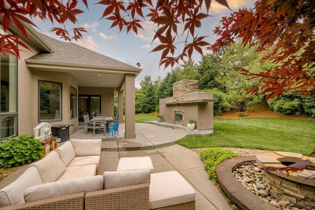 6500 Pheasant Run Ct, Lincoln, NE 68516 - view of patio featuring an outdoor living space with a fireplace