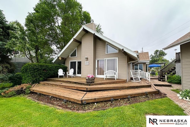 2203 Beaver Lake Blvd, Plattsmouth, NE 68048 - rear view of house with a deck, a chimney, and a yard