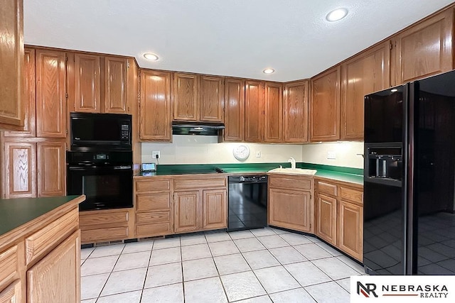 2203 Beaver Lake Blvd, Plattsmouth, NE 68048 - kitchen with black appliances, a sink, light tile patterned floors, recessed lighting, and extractor fan