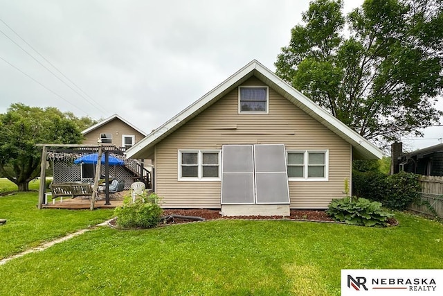 2203 Beaver Lake Blvd, Plattsmouth, NE 68048 - back of house with a wooden deck