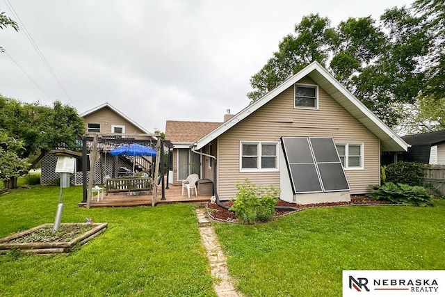 2203 Beaver Lake Blvd, Plattsmouth, NE 68048 - back of property with a deck and a chimney