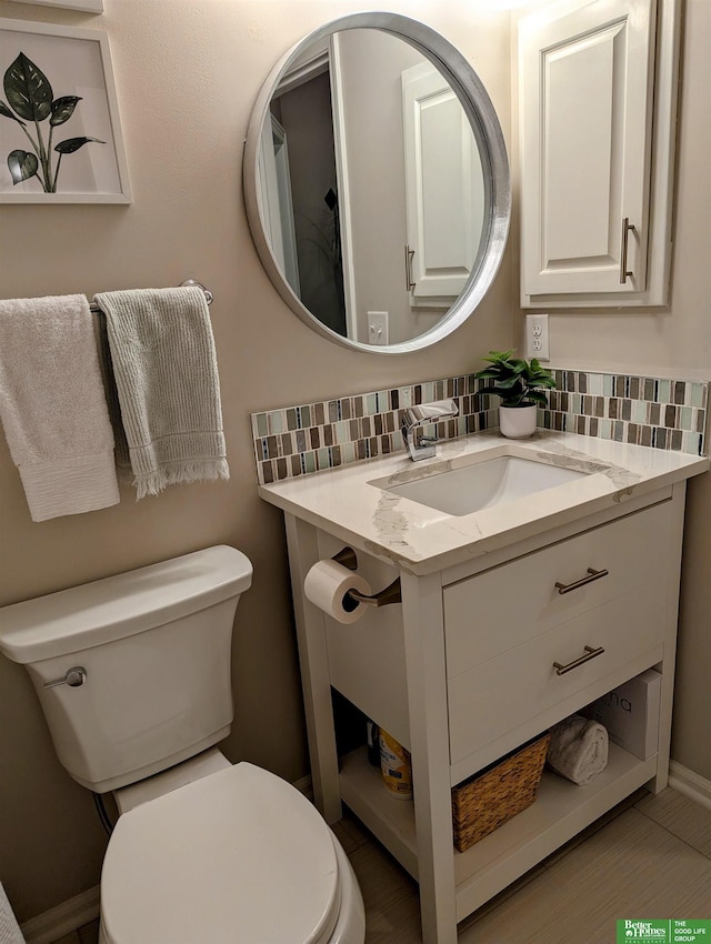 948 S 183rd St, Elkhorn, NE 68022 - half bath with toilet, vanity, and tasteful backsplash