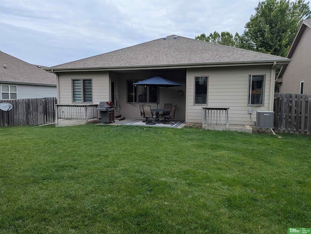948 S 183rd St, Elkhorn, NE 68022 - back of property with a patio, roof with shingles, and central AC