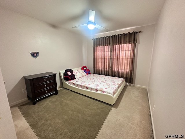 7014 N 89th St, Omaha, NE 68122 - carpeted bedroom featuring baseboards and a ceiling fan