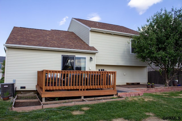 7014 N 89th St, Omaha, NE 68122 - back of property with a wooden deck, central AC, and a shingled roof