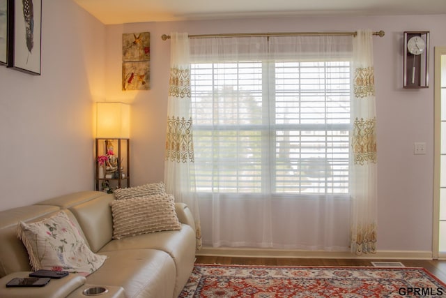 7014 N 89th St, Omaha, NE 68122 - sitting room featuring plenty of natural light and wood finished floors