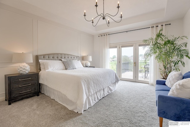 9711 S 176th St, Omaha, NE 68136 - bedroom with light carpet, access to outside, a chandelier, and french doors