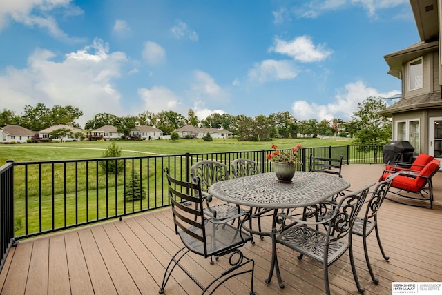 9711 S 176th St, Omaha, NE 68136 - wooden terrace with grilling area, a yard, outdoor dining area, and a residential view