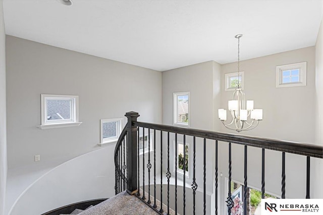 18402 Polk St, Omaha, NE 68135 - stairs featuring a chandelier