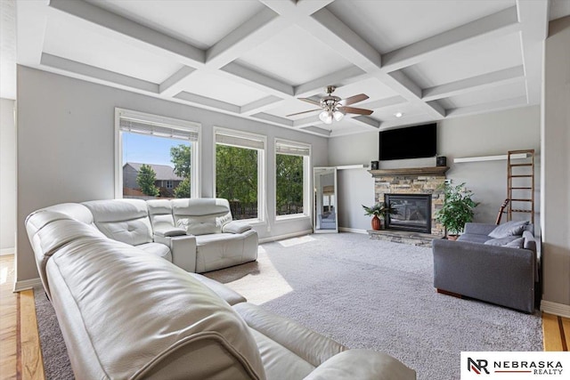 18402 Polk St, Omaha, NE 68135 - living area featuring baseboards, beamed ceiling, a fireplace, a ceiling fan, and coffered ceiling