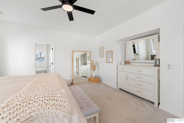 4706 S 187th Ave, Omaha, NE 68135 - bedroom featuring light carpet, connected bathroom, a ceiling fan, and baseboards
