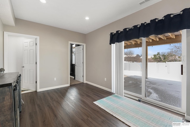 4706 S 187th Ave, Omaha, NE 68135 - spare room with dark wood finished floors, baseboards, and recessed lighting