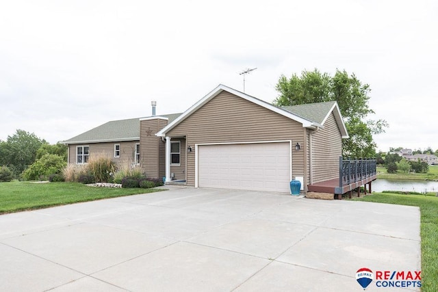 29300 S Golden Pond Rd, Firth, NE 68358 - ranch-style house with a garage, a front yard, and concrete driveway