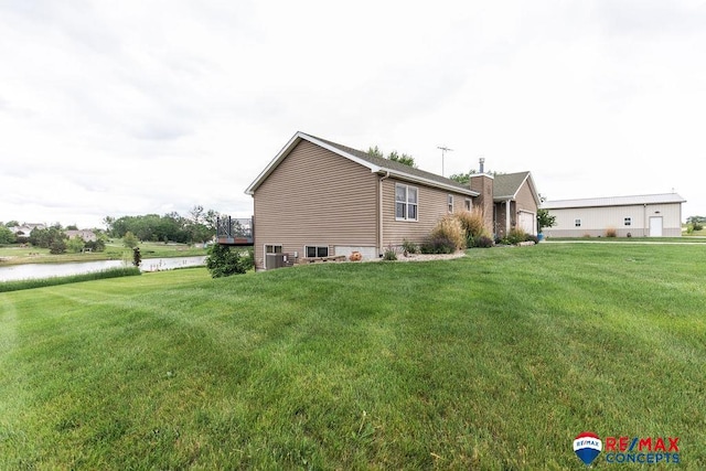 29300 S Golden Pond Rd, Firth, NE 68358 - view of side of home featuring a lawn and a water view